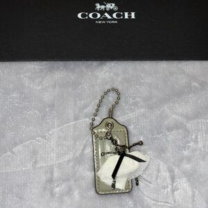 Bag Decor: Coach Gray 2.5” Hang Tag w Ballerina Skeleton Charm